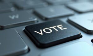 Un clavier avec une touche vote